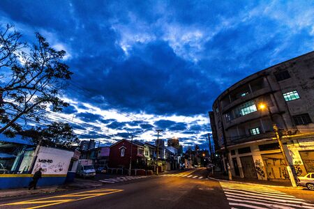 Clouds and lights iver the street in townのeditorial素材