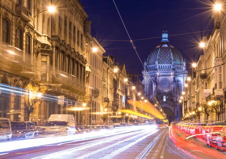 Brussels (Bruxelles) - February 2016, Belgium: Nigh view of the Belgian Capital, car light trails on Rue Royal street, view on Saint Mary's Royal Churchのeditorial素材