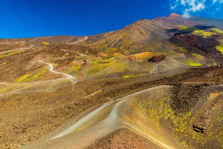 Colorful lava hills and volcanic craters. Mount Etna. Sicily, Italyの写真素材