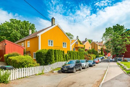 Oslo - June 2019, Norway: A typical street of Oslo with colorful wooden houses in the traditional architectural styleのeditorial素材