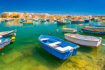 View of colorful fishing boats in Birzebbuga, Maltaの写真素材