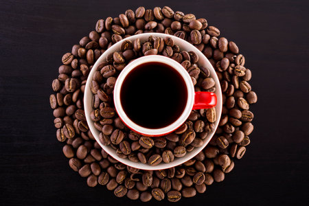 Black coffee with dark coffee beans