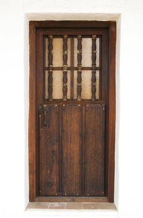 An old and decorative wooden door from an historical building in Californiaの写真素材