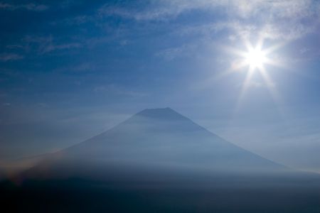 Mount Fuji with radiating sunの写真素材