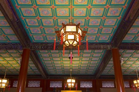 A highly decorative ceiling in an old house in Beijingの写真素材