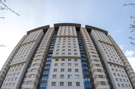 Bottom view on skyscraper on a background of blue skyの写真素材