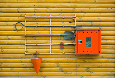 Fire safety equipment un the woodの写真素材