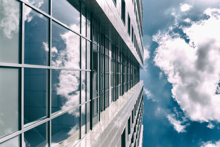 Bottom view on skyscraper on a background of blue skyの写真素材