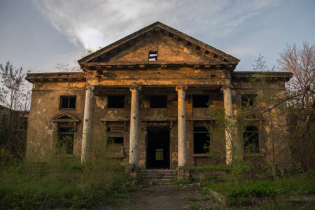 Old damaged big house, orange, sunset,tampleの写真素材