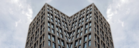 Abstract view on skyscraper on a background of blue skyの写真素材