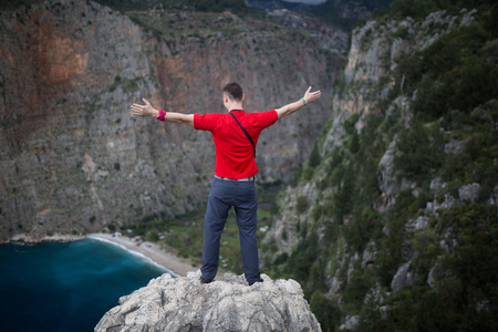 man on top of mountainの写真素材