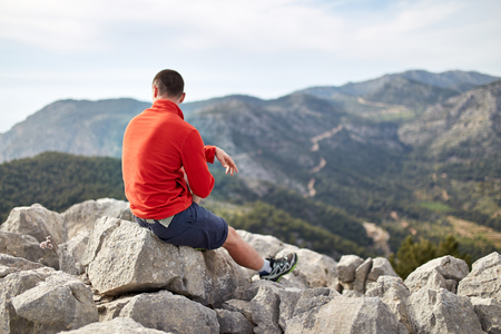 hiker on the top of mountainの写真素材