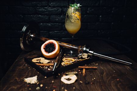 Hookah tobacco with the taste of mango, pomegranate and quince.Tobacco with the aroma of tropical fruits.Oriental smoking shishaの写真素材