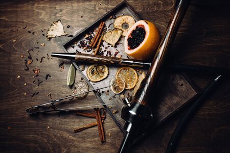 Hookah tobacco with the taste of mango, pomegranate and quince.Tobacco with the aroma of tropical fruits.Oriental smoking shishaの写真素材