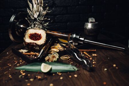 Hookah tobacco with the taste of mango, pomegranate and quince.Tobacco with the aroma of tropical fruits.Oriental smoking shishaの写真素材