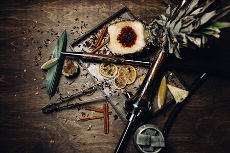 Hookah tobacco with the taste of mango, pomegranate and quince.Tobacco with the aroma of tropical fruits.Oriental smoking shishaの写真素材