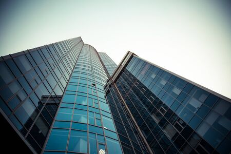 Bottom view on skyscraper on a background of blue skyの写真素材