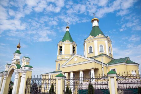 Christian church with green domes against the skyの写真素材
