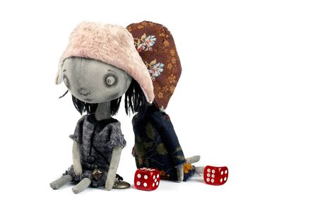 Rag sad dolls on the white backgroundの写真素材