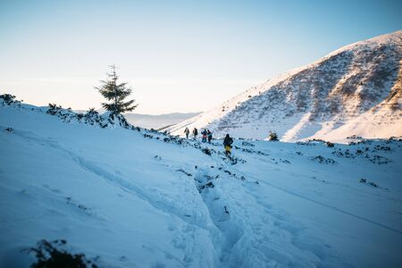 People goes to the top of the mountain