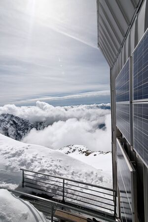 solar panels on top of the mountainの写真素材