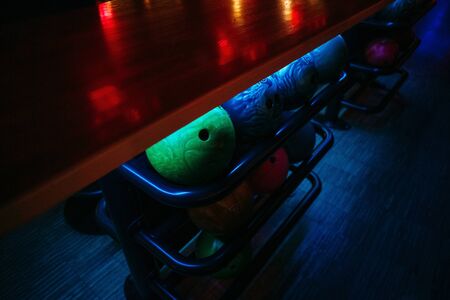 bowling balls under the table on which the light falls, background texture
