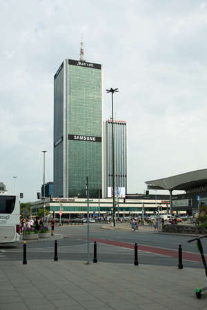 glass central skyscraper in poland against a blue sky with cloudsのeditorial素材