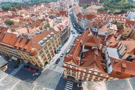 top view of orange rooftops in prague against blue skyのeditorial素材