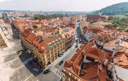 top view of orange rooftops in prague against blue skyのeditorial素材