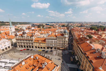 top view of orange rooftops in prague against blue skyのeditorial素材