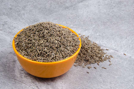 Indian spices cumin seeds isolated.