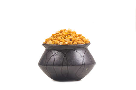 Yellow Lentil isolated on white background.