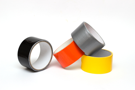 colorful tape rolls background on whiteの写真素材