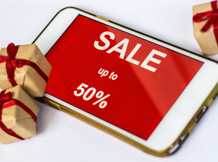 Black friday and sale inscription on smartphone screen.の写真素材