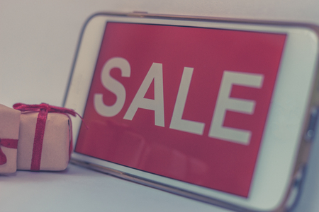 Black friday and sale inscription on smartphone screen.の写真素材