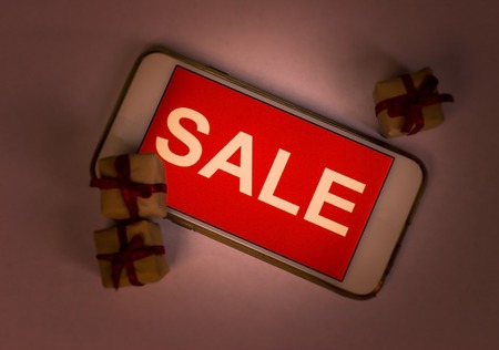 Black friday and sale inscription on smartphone screen.の写真素材