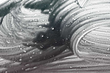 Abstract liquid background texture in purple.の写真素材