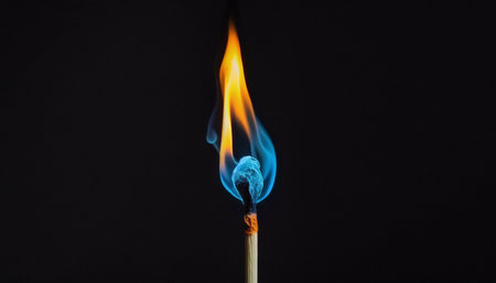 One wooden match with a blue flame, on a black background. Generative AI.の素材