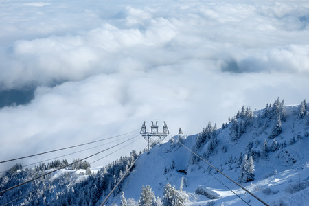 Towards the Stanserhorn on Cabrio cable car in cloudy day.の写真素材