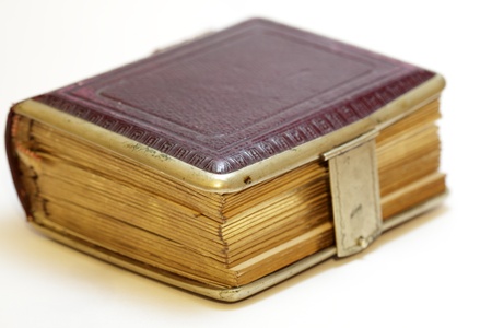 old photo album with gold edges and leatherの写真素材