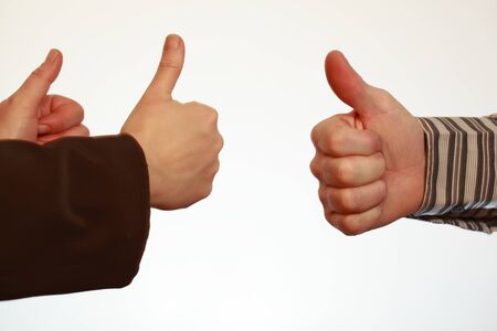 Woman and man hands making sign Okの写真素材