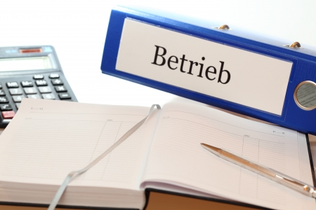 folders - concept for modern business with diary and calculatorの写真素材