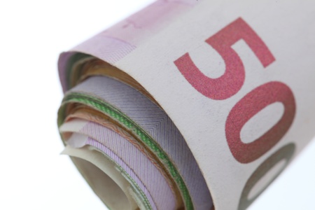 roll of european money on white backgroundの写真素材