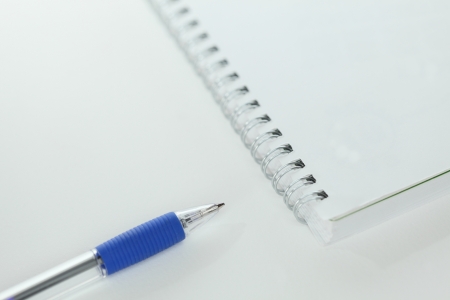 organizer with pen on white backgroundの写真素材