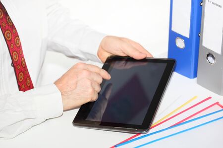 mobile computer with working hands on desk