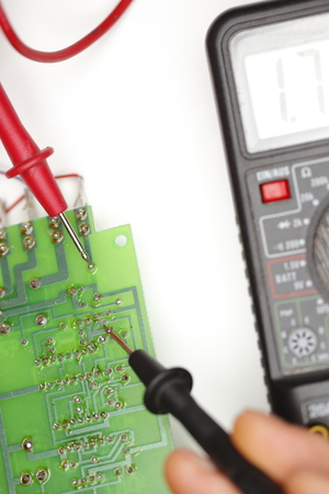 Digital multimeter and electronic parts are tested