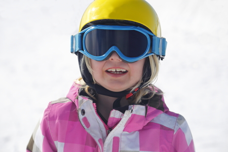 girl is skiing in the mountains, closeupの写真素材