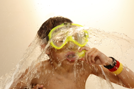 boy have fun with diving and water