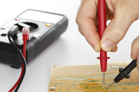 measurement on an electrical component with tool