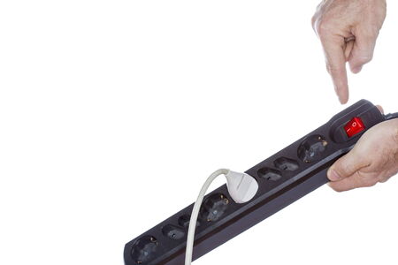 electrical switch with socket on white backgroundの写真素材